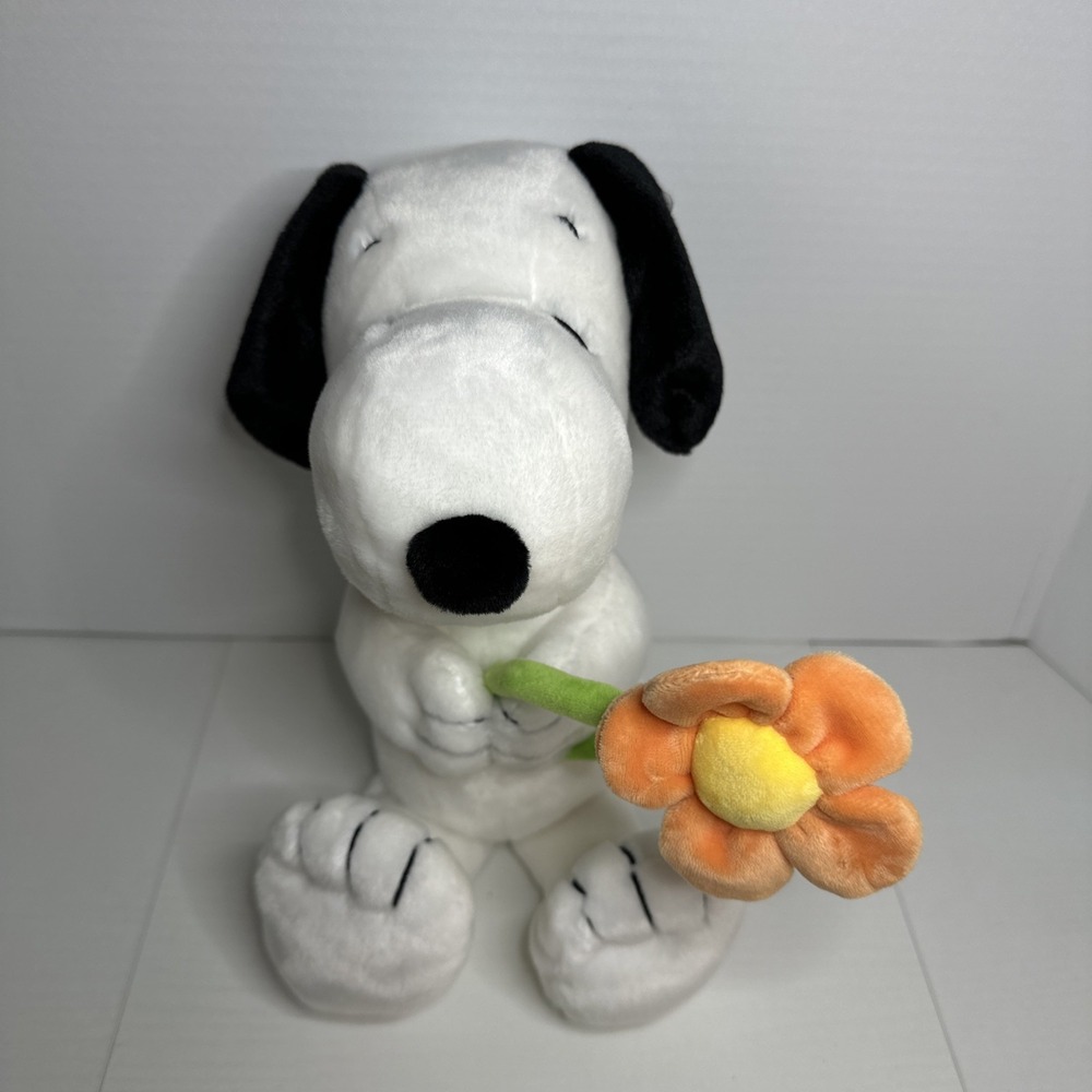 Aurora Peanuts Snoopy Stuffed Animal Plush - with Flower‎ 11 Inches